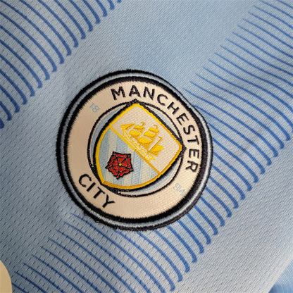 23-24 Uniforme Manchester City Casa Niños